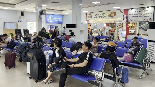 Passengers waiting for a train at Phu Tho Railway Station