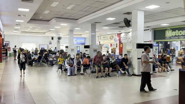 Passengers waiting for a train at Dong Hoi Railway Station