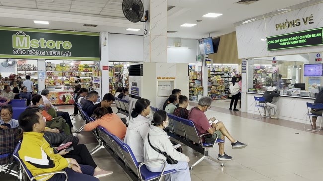 Passengers waiting for a train at Hai Duong Railway Station