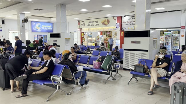 Passengers waiting for a train at Thanh Hoa Railway Station